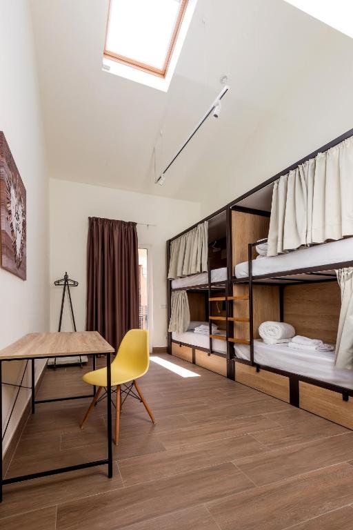 An interior 4-bed mixed dorm room